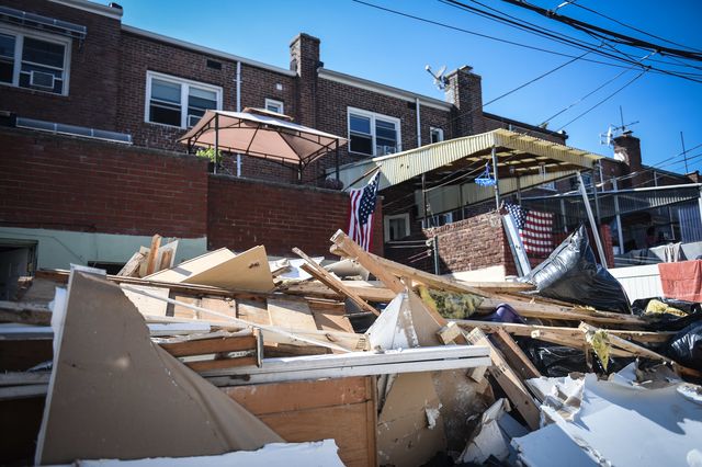 Debris outside homes in Queens